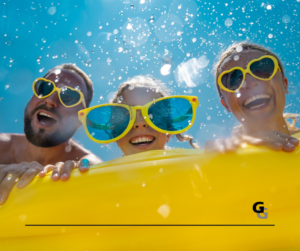Family of 3 Wearing Sunglasses On a Pool Float