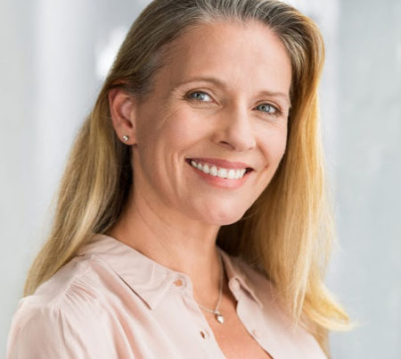 A beautiful middle-aged woman smiling