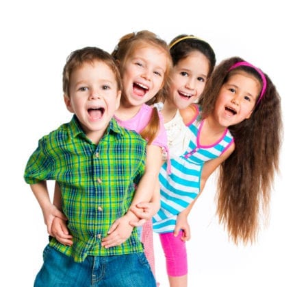 4 small children smiling with their mouths open