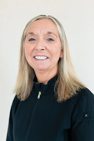 Close up a woman, Wendy, smiling. She is a Dental Assistant